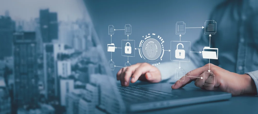 Employee using a laptop with biometric security