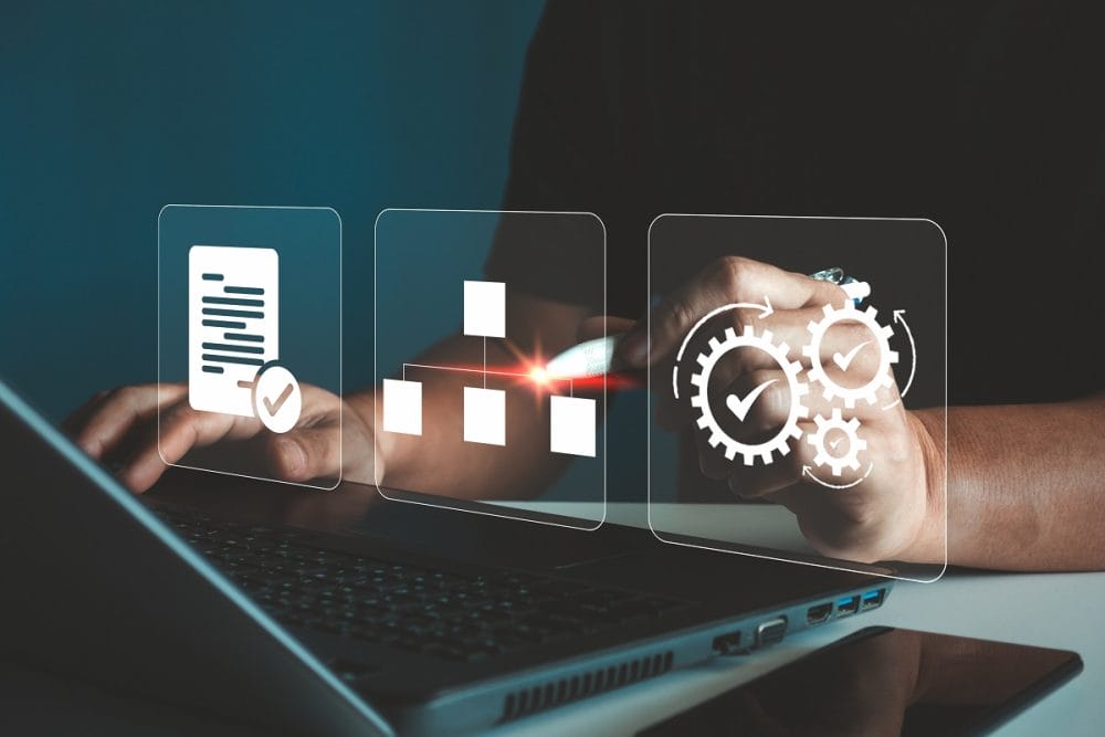 Person working on a laptop with digital icons showing document validation, organizational structure, and automated workflow checks used in corporate KYC and business verification